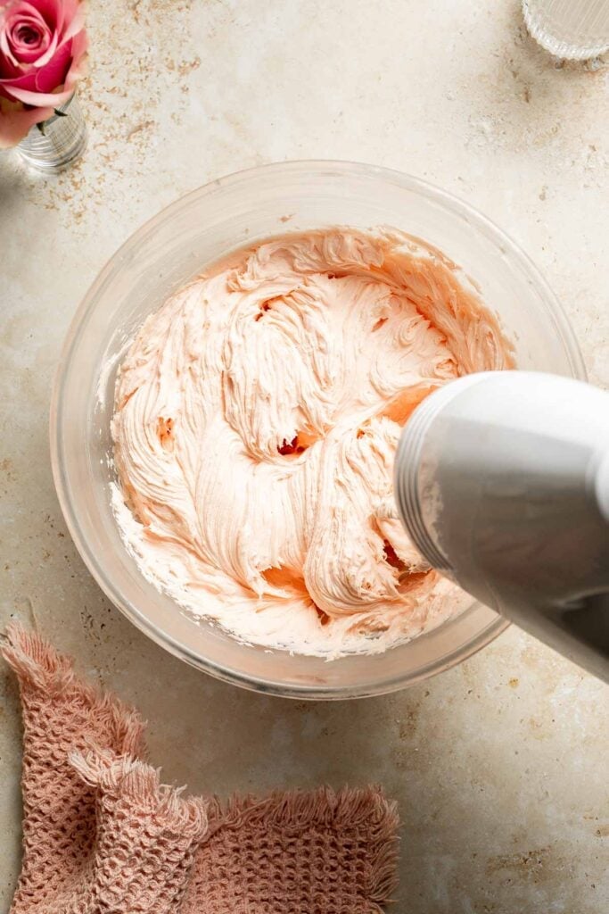 This Mother’s Day, treat someone special (or yourself!) to these beautifully light, airy, and fluffy Vanilla Cupcakes with Rose Petal Buttercream. | aheadofthyme.com