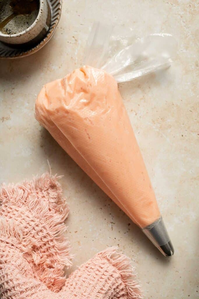 This Mother’s Day, treat someone special (or yourself!) to these beautifully light, airy, and fluffy Vanilla Cupcakes with Rose Petal Buttercream. | aheadofthyme.com
