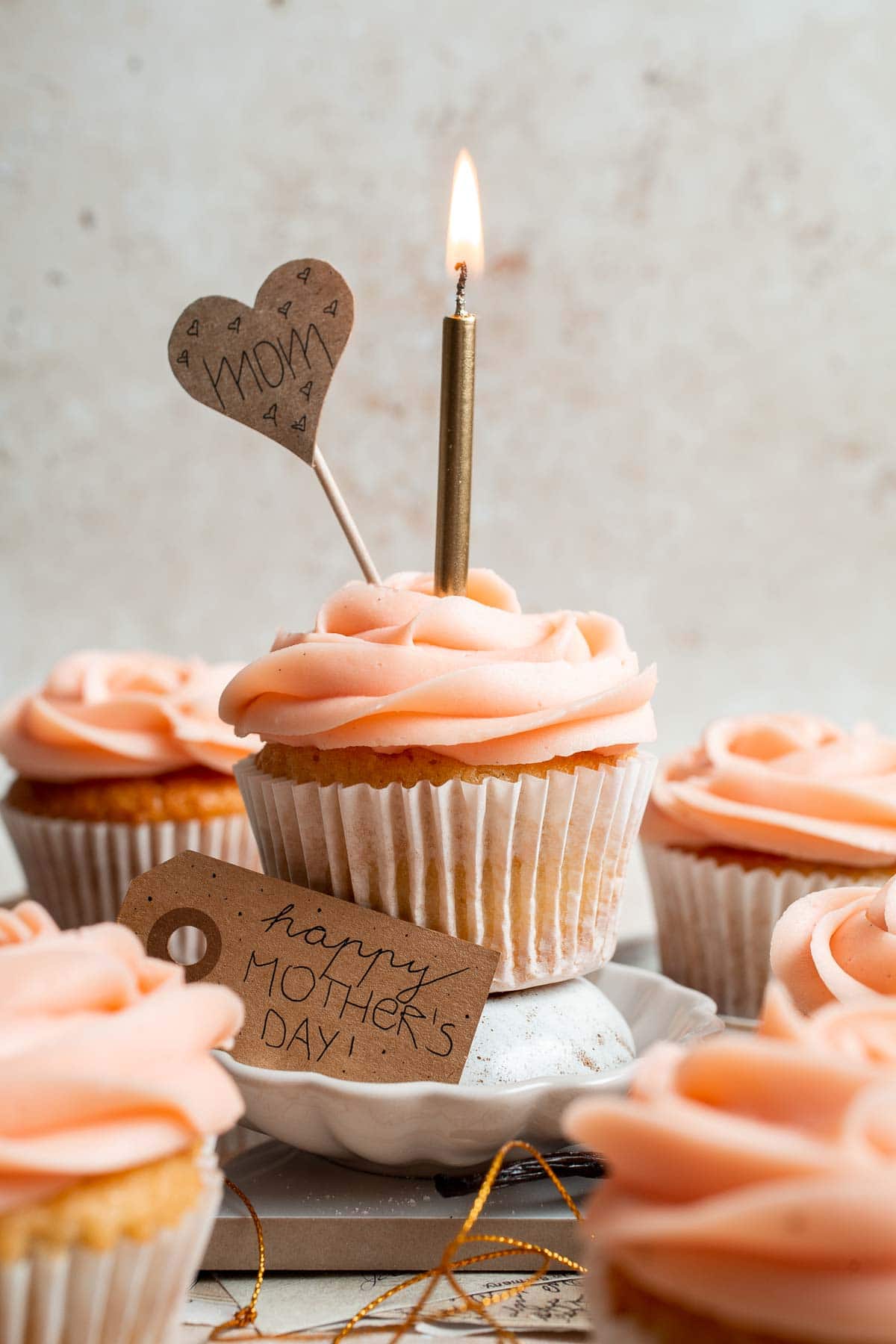 This Mother’s Day, treat someone special (or yourself!) to these beautifully light, airy, and fluffy Vanilla Cupcakes with Rose Petal Buttercream. | aheadofthyme.com