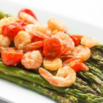 Light, fresh and vibrant, roasted lemon garlic shrimp and asparagus is the perfect dish for the spring and upcoming summer season | aheadofthyme.com