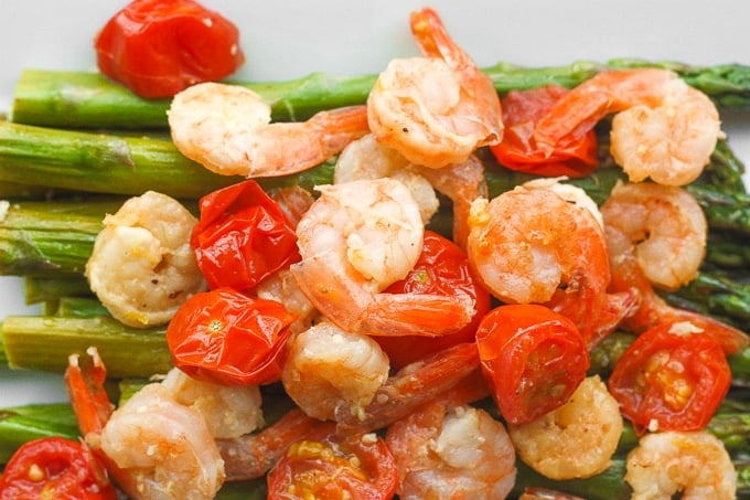 Light, fresh and vibrant, roasted lemon garlic shrimp and asparagus is the perfect dish for the spring and upcoming summer season | aheadofthyme.com