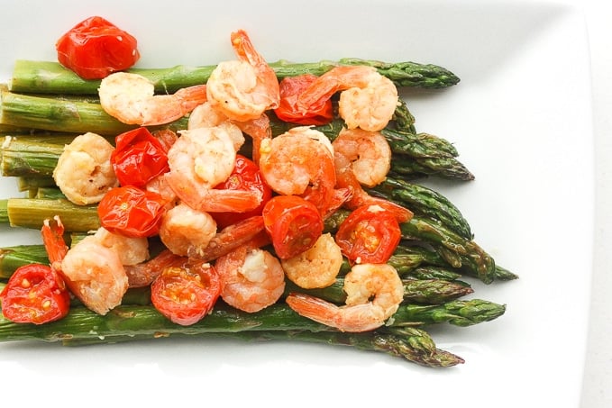 Light, fresh and vibrant, roasted lemon garlic shrimp and asparagus is the perfect dish for the spring and upcoming summer season | aheadofthyme.com