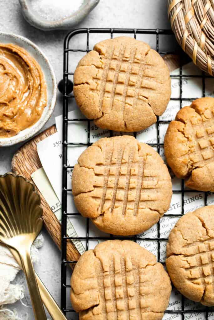 The BEST Soft and Chewy Peanut Butter Cookies are thick, puffy, and melt-in-your-mouth good. Easy to make in under 20 minutes — and they stay soft for days! | aheadofthyme.com
