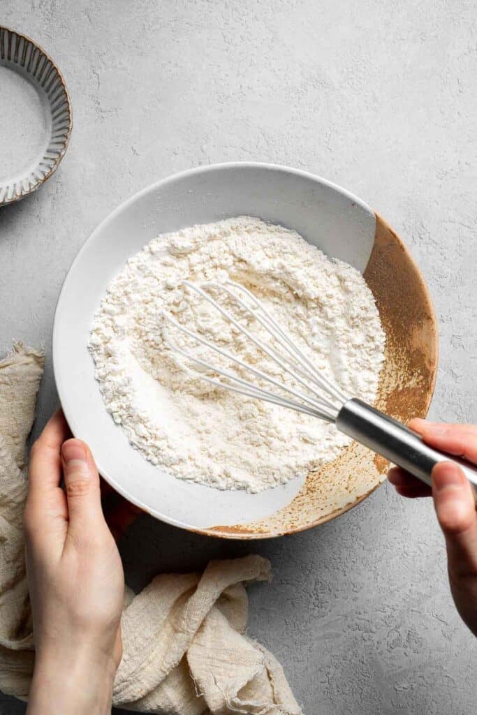The BEST Soft and Chewy Peanut Butter Cookies are thick, puffy, and melt-in-your-mouth good. Easy to make in under 20 minutes — and they stay soft for days! | aheadofthyme.com