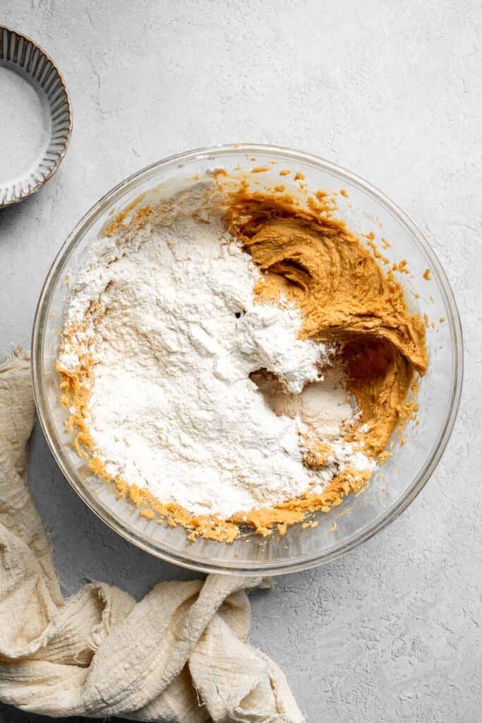 The BEST Soft and Chewy Peanut Butter Cookies are thick, puffy, and melt-in-your-mouth good. Easy to make in under 20 minutes — and they stay soft for days! | aheadofthyme.com