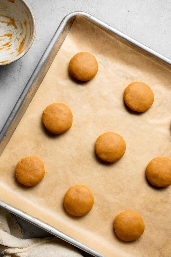 The BEST Soft and Chewy Peanut Butter Cookies are thick, puffy, and melt-in-your-mouth good. Easy to make in under 20 minutes — and they stay soft for days! | aheadofthyme.com