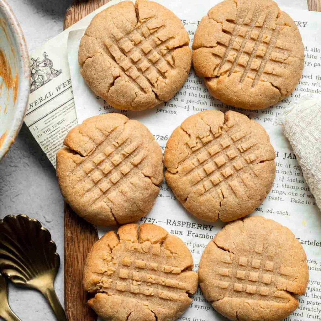 The BEST Soft and Chewy Peanut Butter Cookies are thick, puffy, and melt-in-your-mouth good. Easy to make in under 20 minutes — and they stay soft for days! | aheadofthyme.com