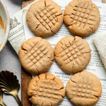 The BEST Soft and Chewy Peanut Butter Cookies are thick, puffy, and melt-in-your-mouth good. Easy to make in under 20 minutes — and they stay soft for days! | aheadofthyme.com