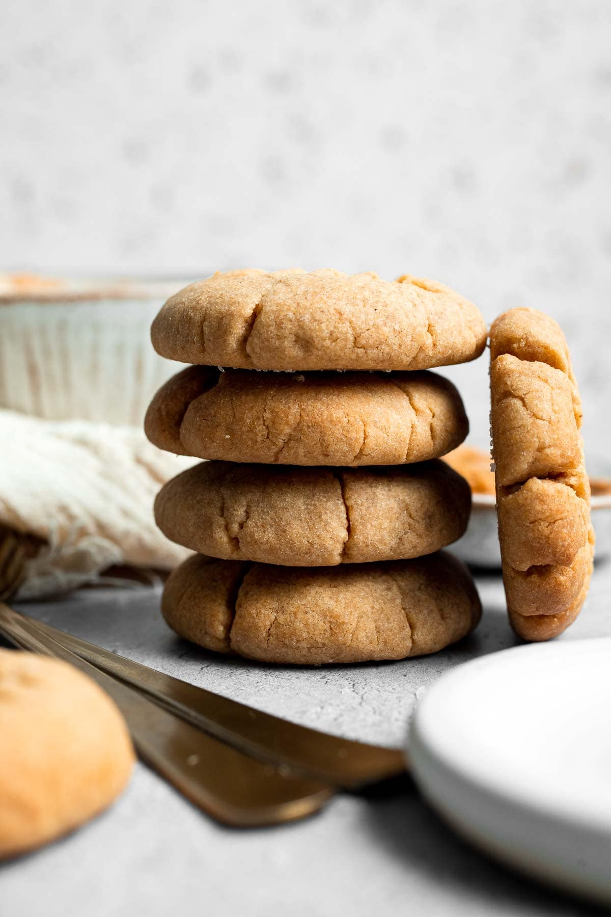 The BEST Soft and Chewy Peanut Butter Cookies are thick, puffy, and melt-in-your-mouth good. Easy to make in under 20 minutes — and they stay soft for days! | aheadofthyme.com