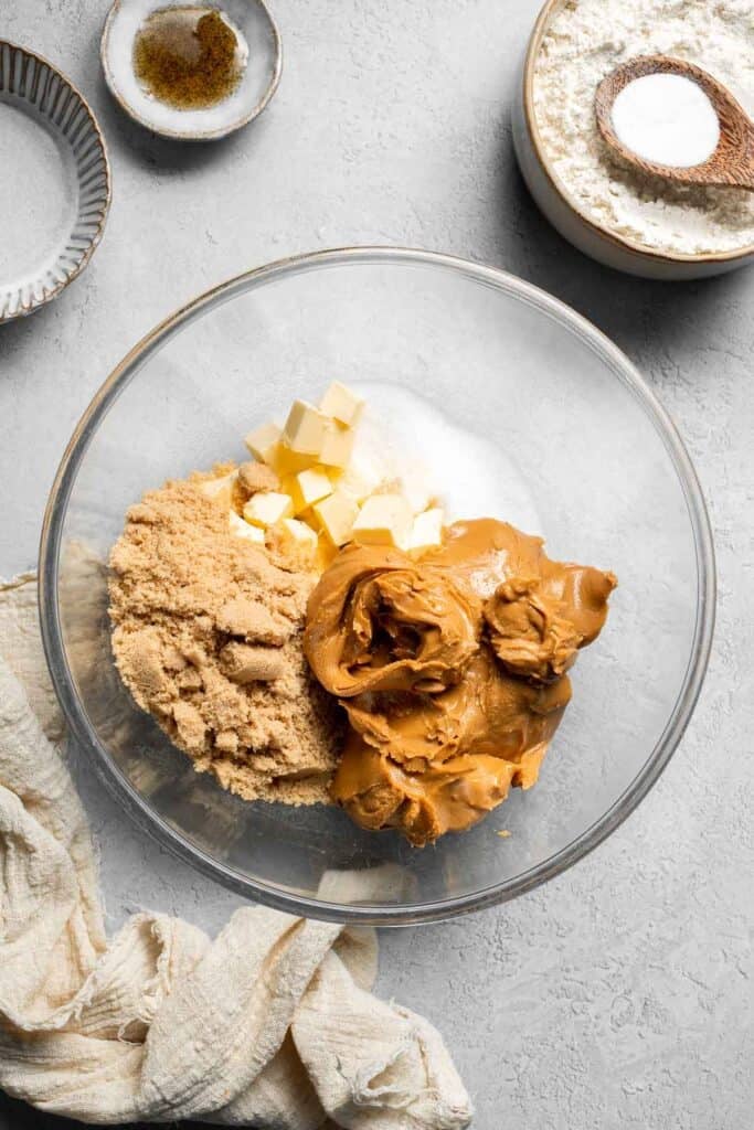 The BEST Soft and Chewy Peanut Butter Cookies are thick, puffy, and melt-in-your-mouth good. Easy to make in under 20 minutes — and they stay soft for days! | aheadofthyme.com