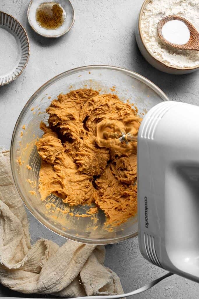 The BEST Soft and Chewy Peanut Butter Cookies are thick, puffy, and melt-in-your-mouth good. Easy to make in under 20 minutes — and they stay soft for days! | aheadofthyme.com