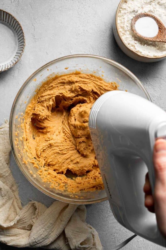 The BEST Soft and Chewy Peanut Butter Cookies are thick, puffy, and melt-in-your-mouth good. Easy to make in under 20 minutes — and they stay soft for days! | aheadofthyme.com