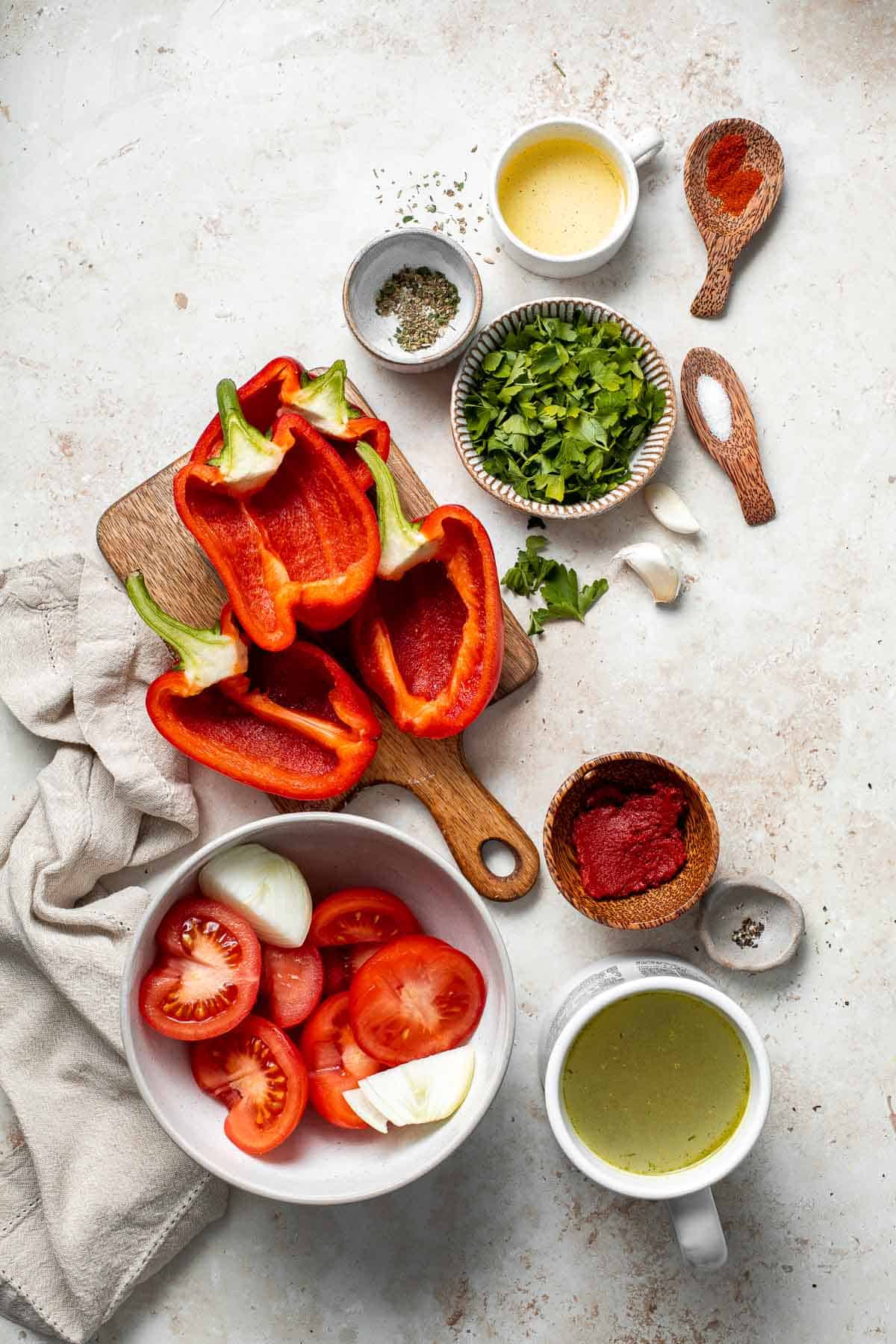 Roasted red pepper and tomato soup is silky smooth, incredibly flavorful and delicious, and easy to make. This vegan soup is healthy and nutritious too. | aheadofthyme.com