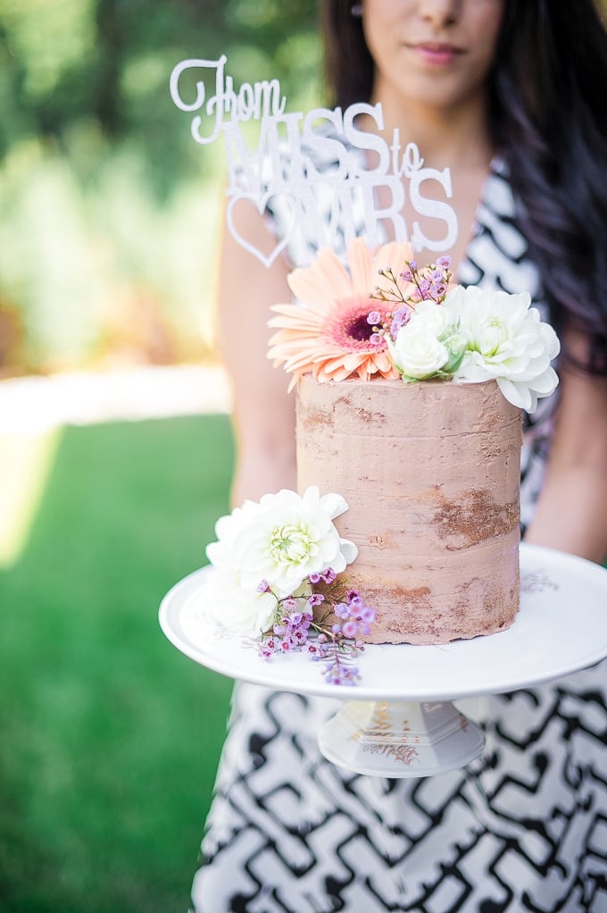 Creamy Nutella Buttercream Frosting: Decorate any cake or cupcake with this creamy Nutella buttercream frosting and turn your dessert into an exquisite and decadent masterpiece. | aheadofthyme.com