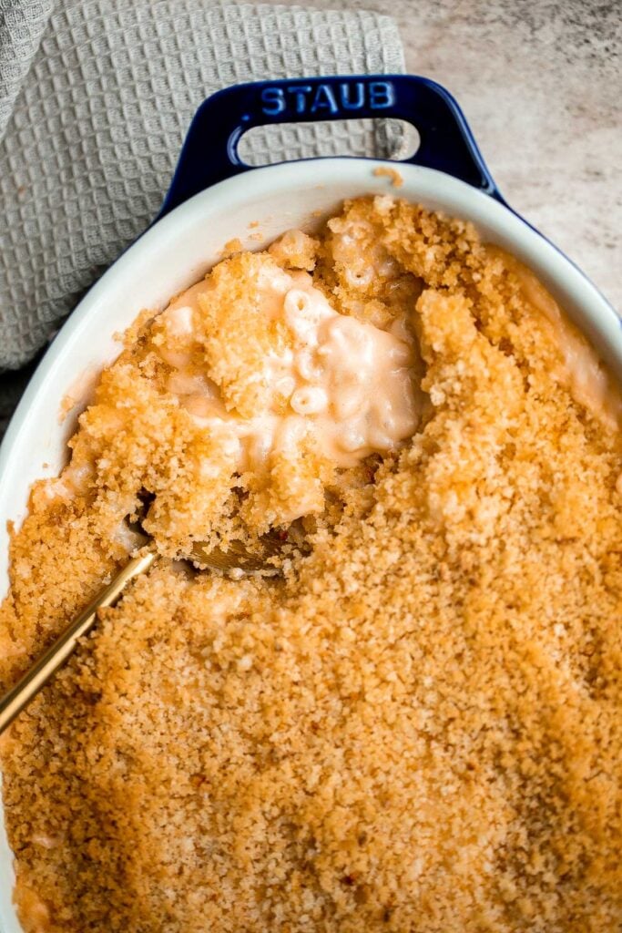 Classic baked mac and cheese is the ultimate comfort food — creamy, cheesy, and cozy, topped with a crunchy breadcrumb topping. It's quick and easy too. | aheadofthyme.com