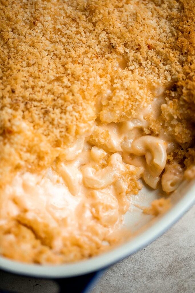 Classic baked mac and cheese is the ultimate comfort food — creamy, cheesy, and cozy, topped with a crunchy breadcrumb topping. It's quick and easy too. | aheadofthyme.com