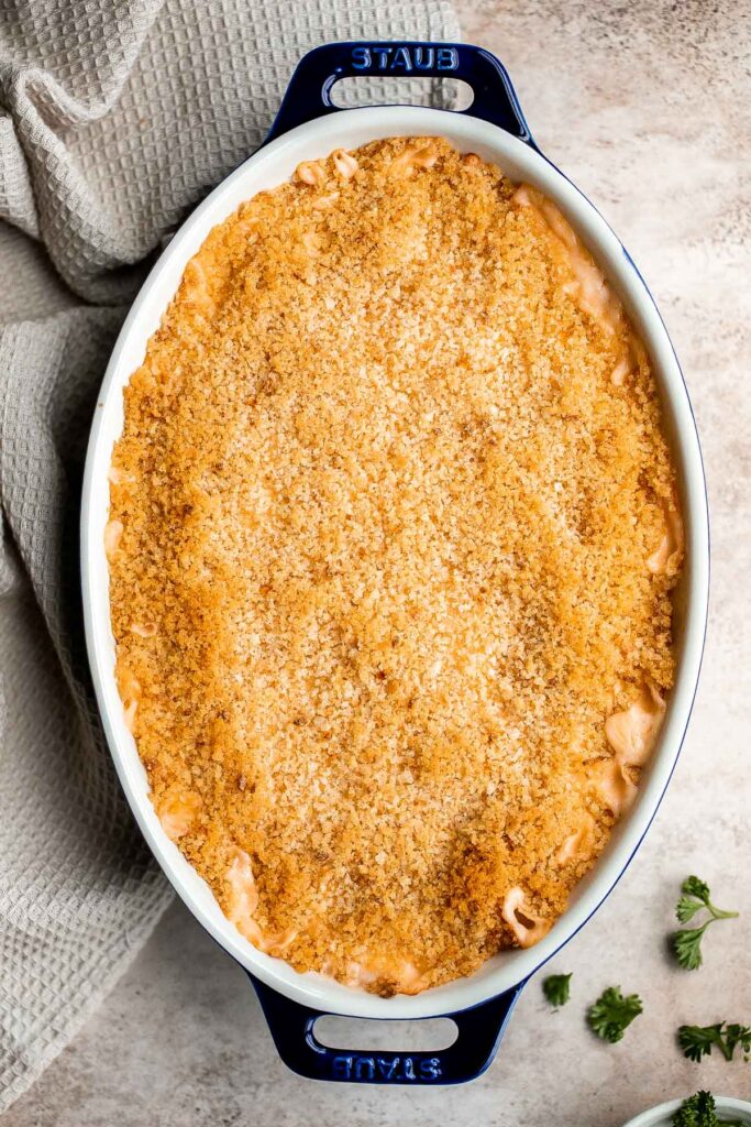 Classic baked mac and cheese is the ultimate comfort food — creamy, cheesy, and cozy, topped with a crunchy breadcrumb topping. It's quick and easy too. | aheadofthyme.com