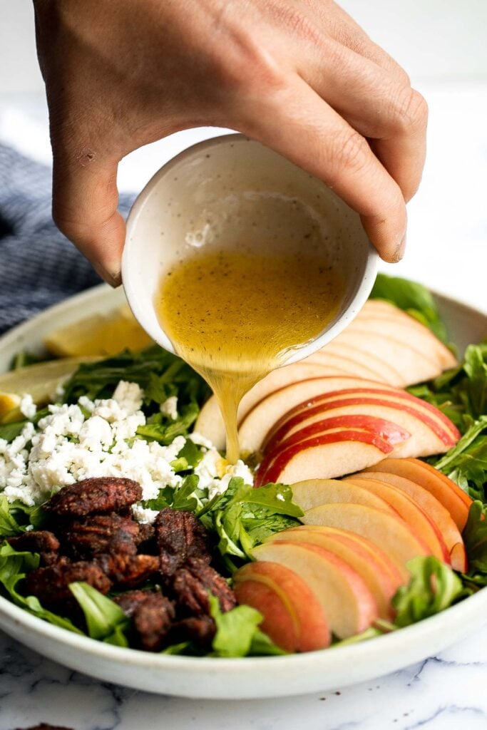 Arugula salad with apple and pecan is a quick and easy fall salad made with fresh seasonal ingredients in just minutes. Perfect for a holiday dinner table. | aheadofthyme.com