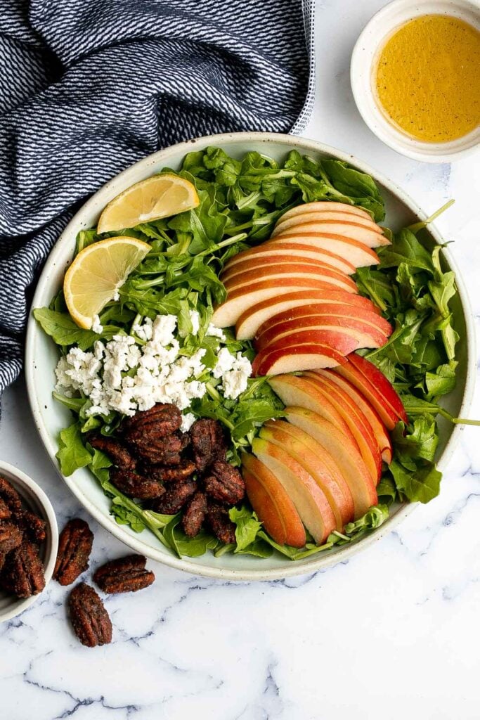 Arugula salad with apple and pecan is a quick and easy fall salad made with fresh seasonal ingredients in just minutes. Perfect for a holiday dinner table. | aheadofthyme.com