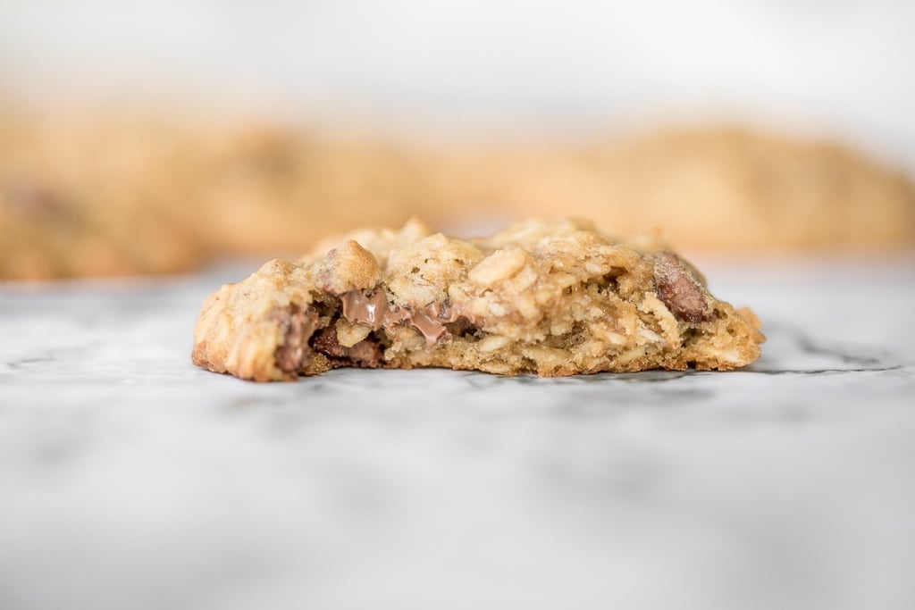 Grab a tall glass of milk and start dipping the best homemade, soft-centered, chewy chocolate chip oatmeal cookies you will ever try! | aheadofthyme.com