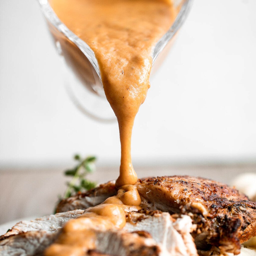 Classic Homemade Turkey Gravy is rich, smooth, and delicious, made from leftover drippings and turkey stock. The perfect easy Thanksgiving gravy recipe. | aheadofthyme.com