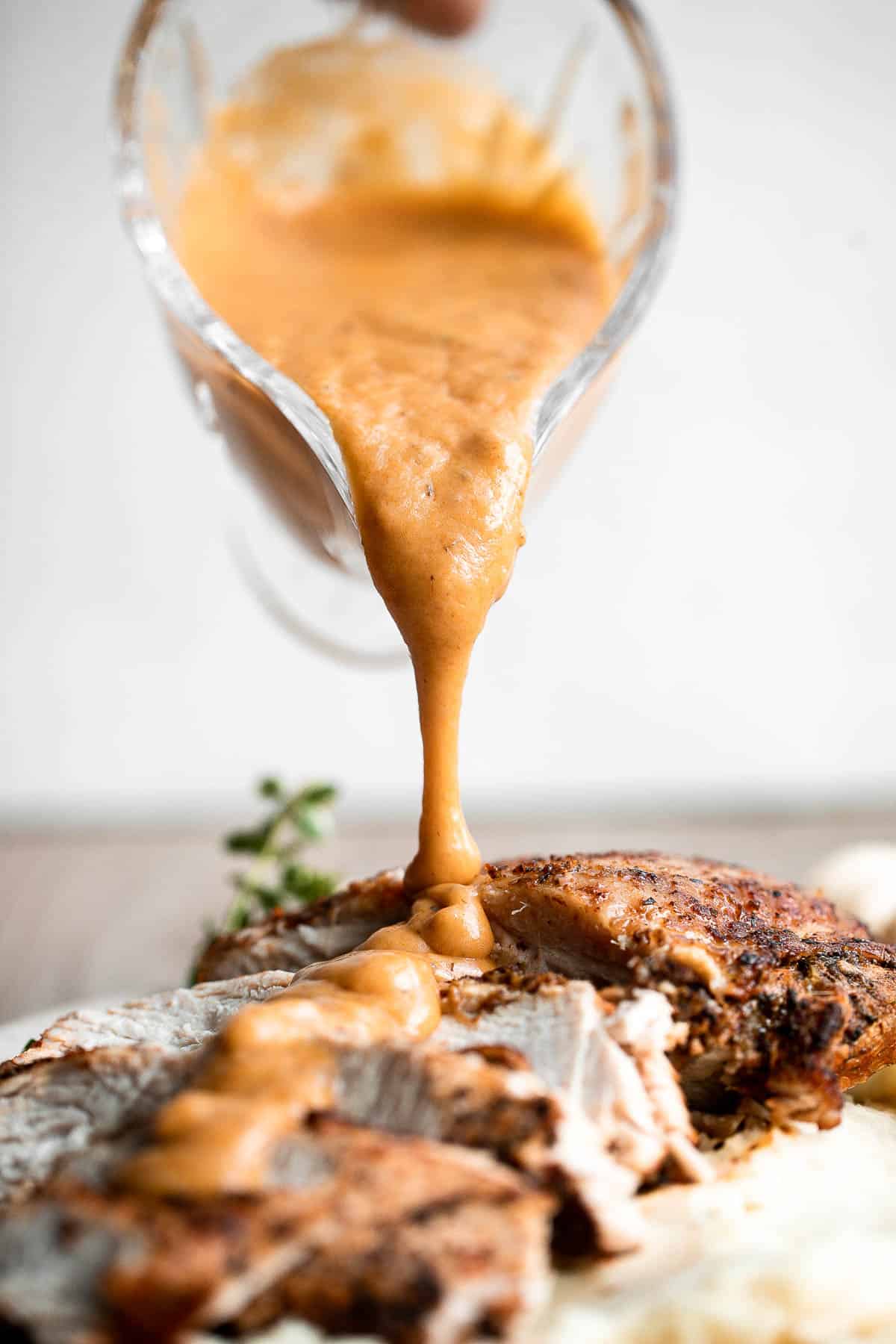 Classic Homemade Turkey Gravy is rich, smooth, and delicious, made from leftover drippings and turkey stock. The perfect easy Thanksgiving gravy recipe. | aheadofthyme.com
