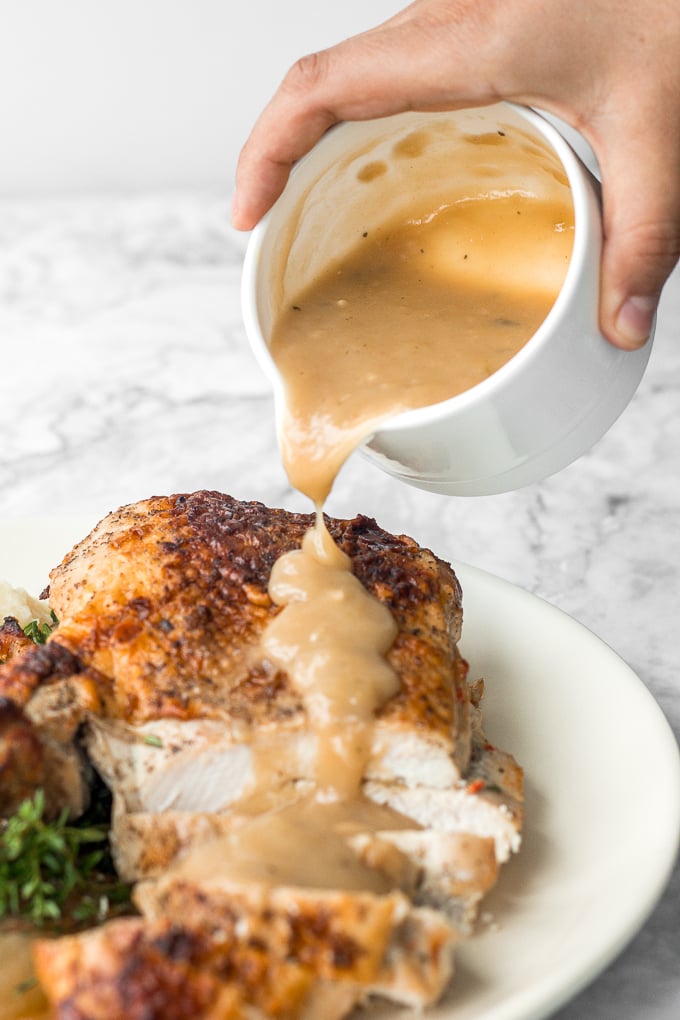 Thanksgiving is not the same without thick and delicious, classic homemade turkey gravy made using leftover drippings and homemade turkey stock. | aheadofthyme.com