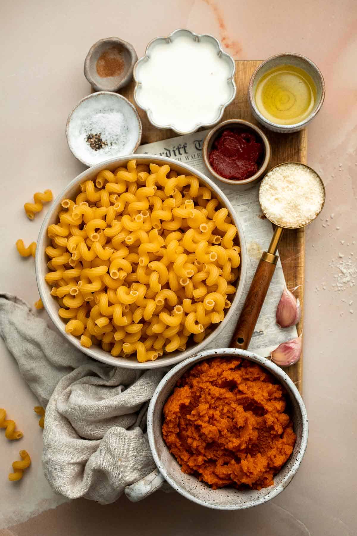 Pumpkin Pasta is one of the quickest and easiest pasta dishes you can make this fall! It's flavorful, creamy, cheesy, and made with real pumpkin! | aheadofthyme.com