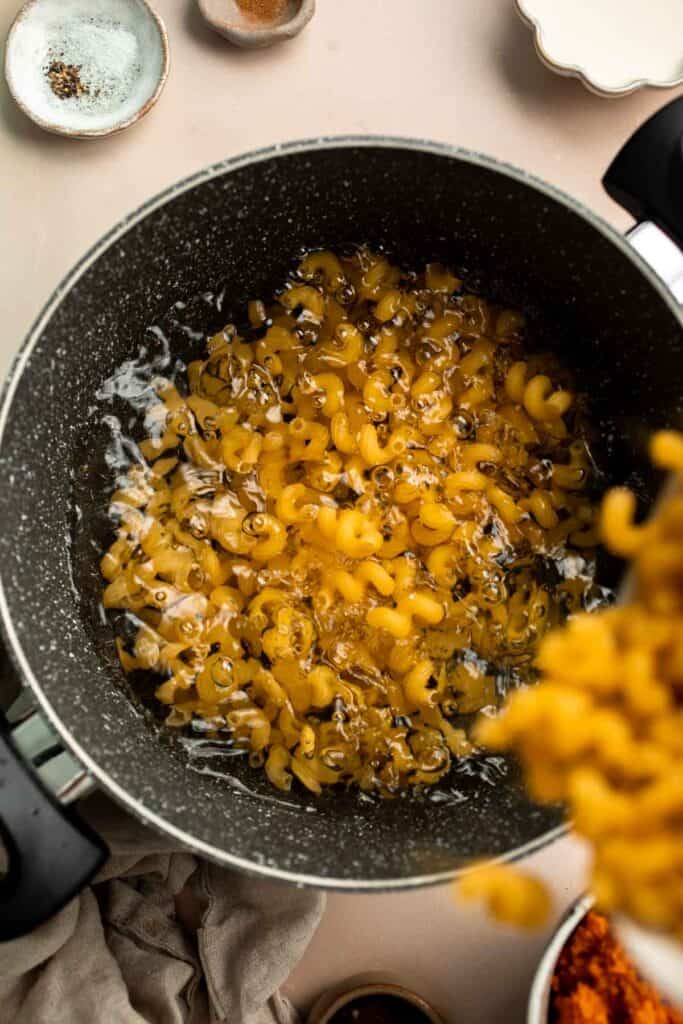 Pumpkin Pasta is one of the quickest and easiest pasta dishes you can make this fall! It's flavorful, creamy, cheesy, and made with real pumpkin! | aheadofthyme.com