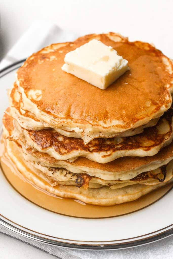 No breakfast spread is complete without a stack of the best, soft and fluffiest old fashioned pancakes. Easy to make in less than 15 minutes! | aheadofthyme.com