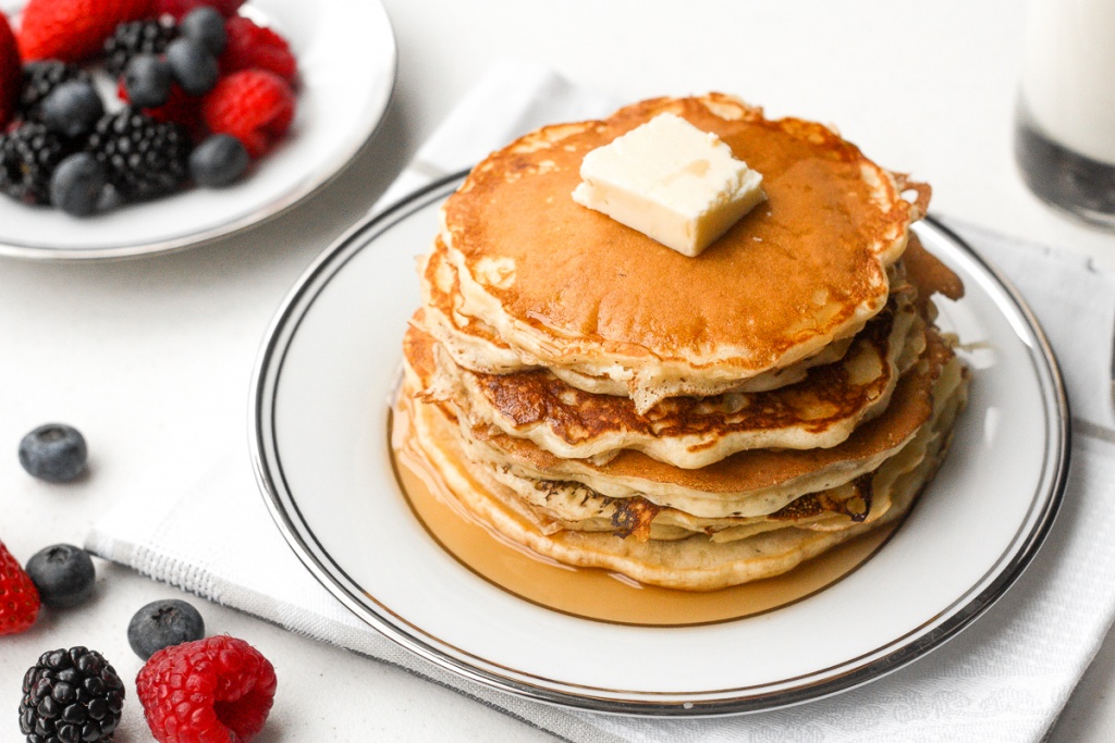 No breakfast spread is complete without a stack of the best, soft and fluffiest old fashioned pancakes. Easy to make in less than 15 minutes! | aheadofthyme.com
