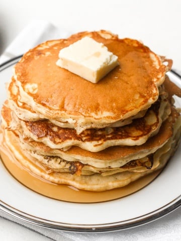 No breakfast spread is complete without a stack of the best, soft and fluffiest old fashioned pancakes. Easy to make in less than 15 minutes! | aheadofthyme.com
