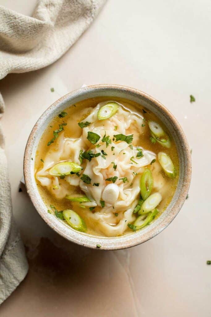 Easy 10-minute Wonton Soup is filling, delicious, and flavorful. With just a handful of simple ingredients, this homemade soup is ready in only 10 minutes! | aheadofthyme.com