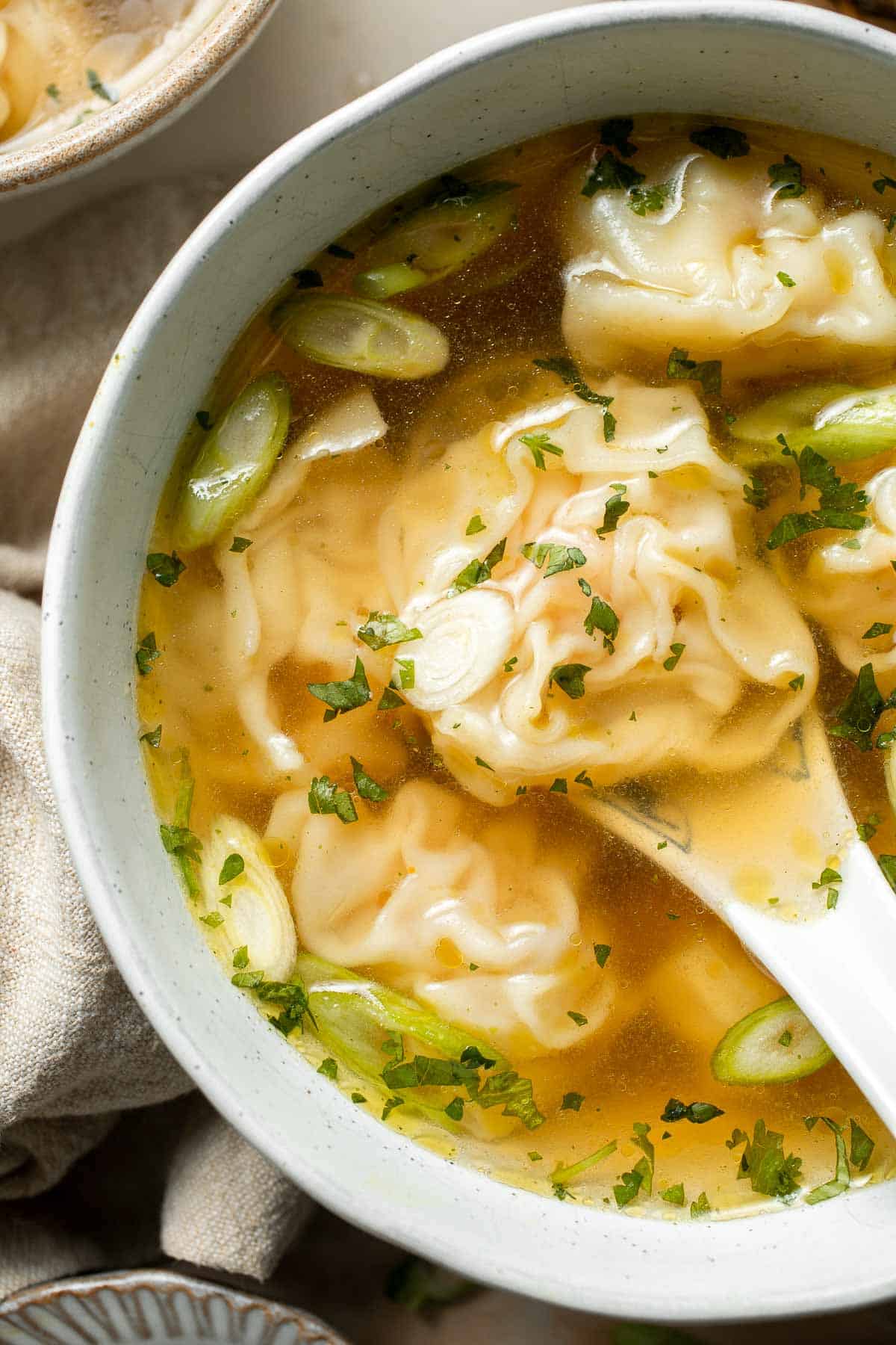 Easy 10-minute Wonton Soup is filling, delicious, and flavorful. With just a handful of simple ingredients, this homemade soup is ready in only 10 minutes! | aheadofthyme.com