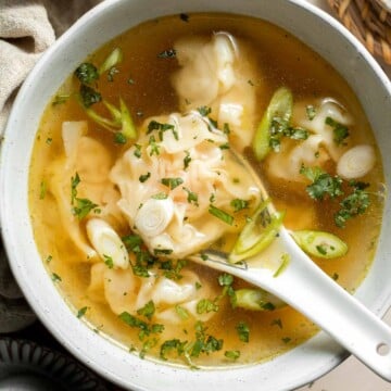 Easy 10-minute Wonton Soup is filling, delicious, and flavorful. With just a handful of simple ingredients, this homemade soup is ready in only 10 minutes! | aheadofthyme.com