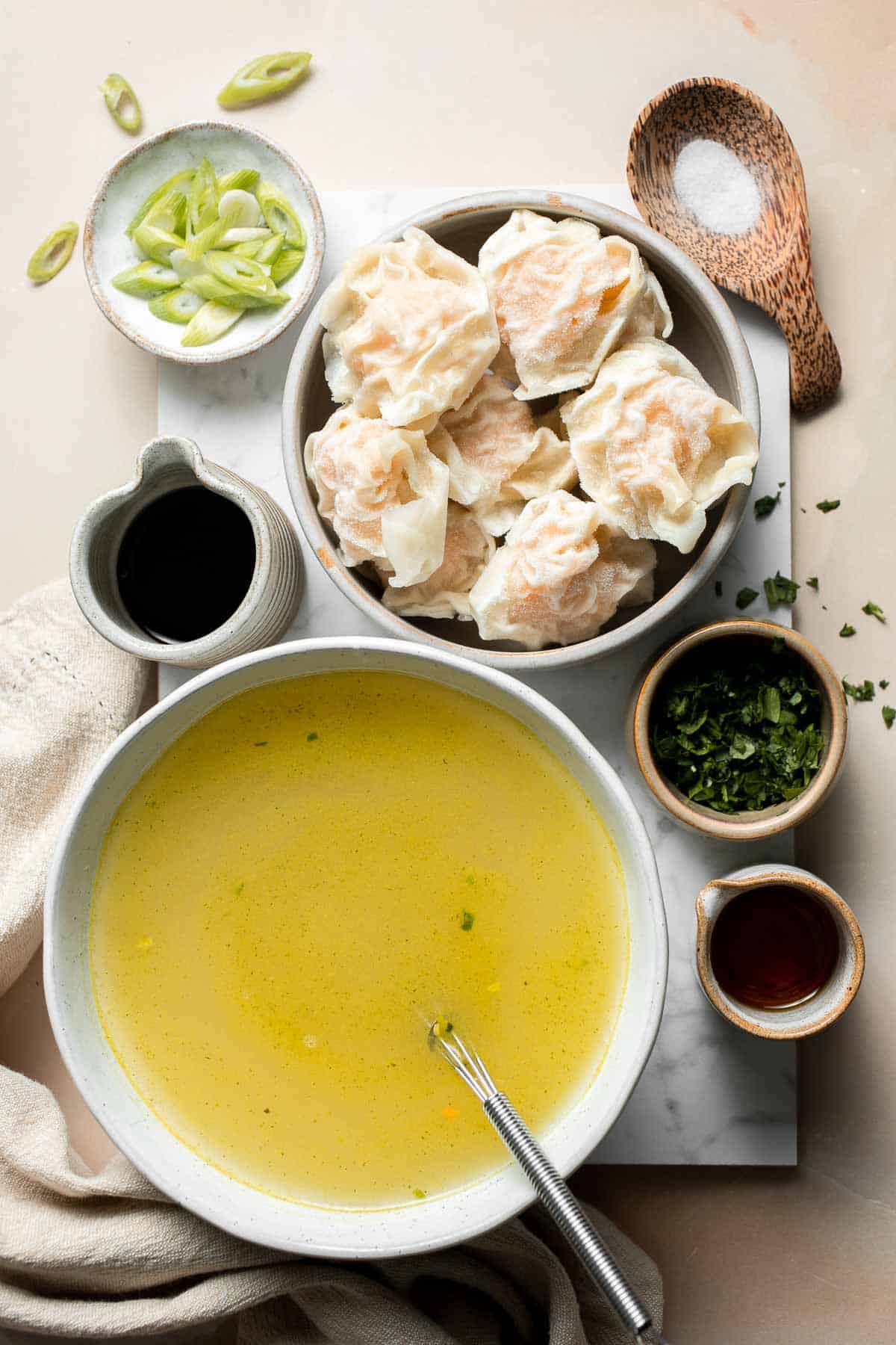 Easy 10-minute Wonton Soup is filling, delicious, and flavorful. With just a handful of simple ingredients, this homemade soup is ready in only 10 minutes! | aheadofthyme.com