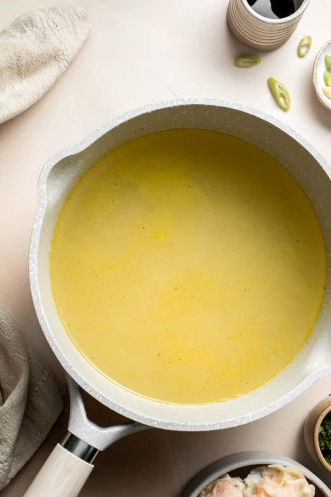 Easy 10-minute Wonton Soup is filling, delicious, and flavorful. With just a handful of simple ingredients, this homemade soup is ready in only 10 minutes! | aheadofthyme.com
