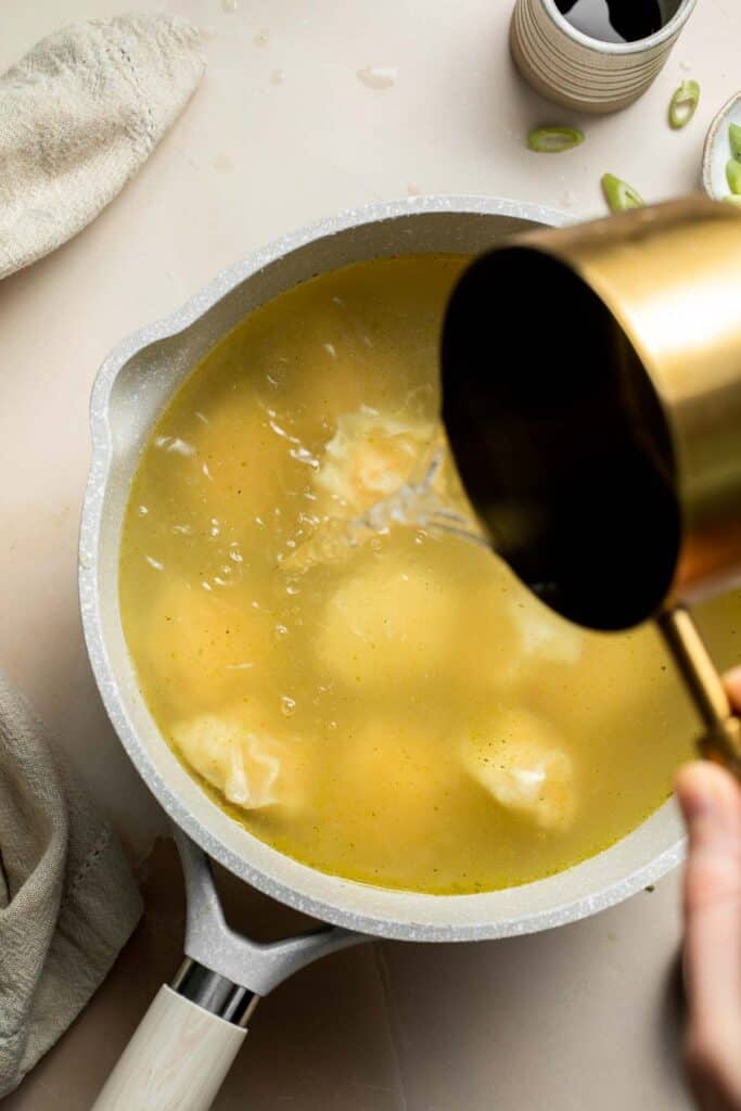 Easy 10-minute Wonton Soup is filling, delicious, and flavorful. With just a handful of simple ingredients, this homemade soup is ready in only 10 minutes! | aheadofthyme.com