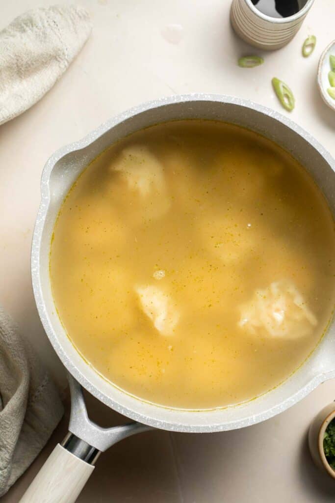 Easy 10-minute Wonton Soup is filling, delicious, and flavorful. With just a handful of simple ingredients, this homemade soup is ready in only 10 minutes! | aheadofthyme.com