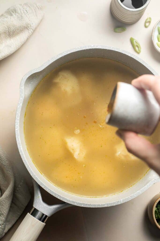 Easy 10-minute Wonton Soup is filling, delicious, and flavorful. With just a handful of simple ingredients, this homemade soup is ready in only 10 minutes! | aheadofthyme.com