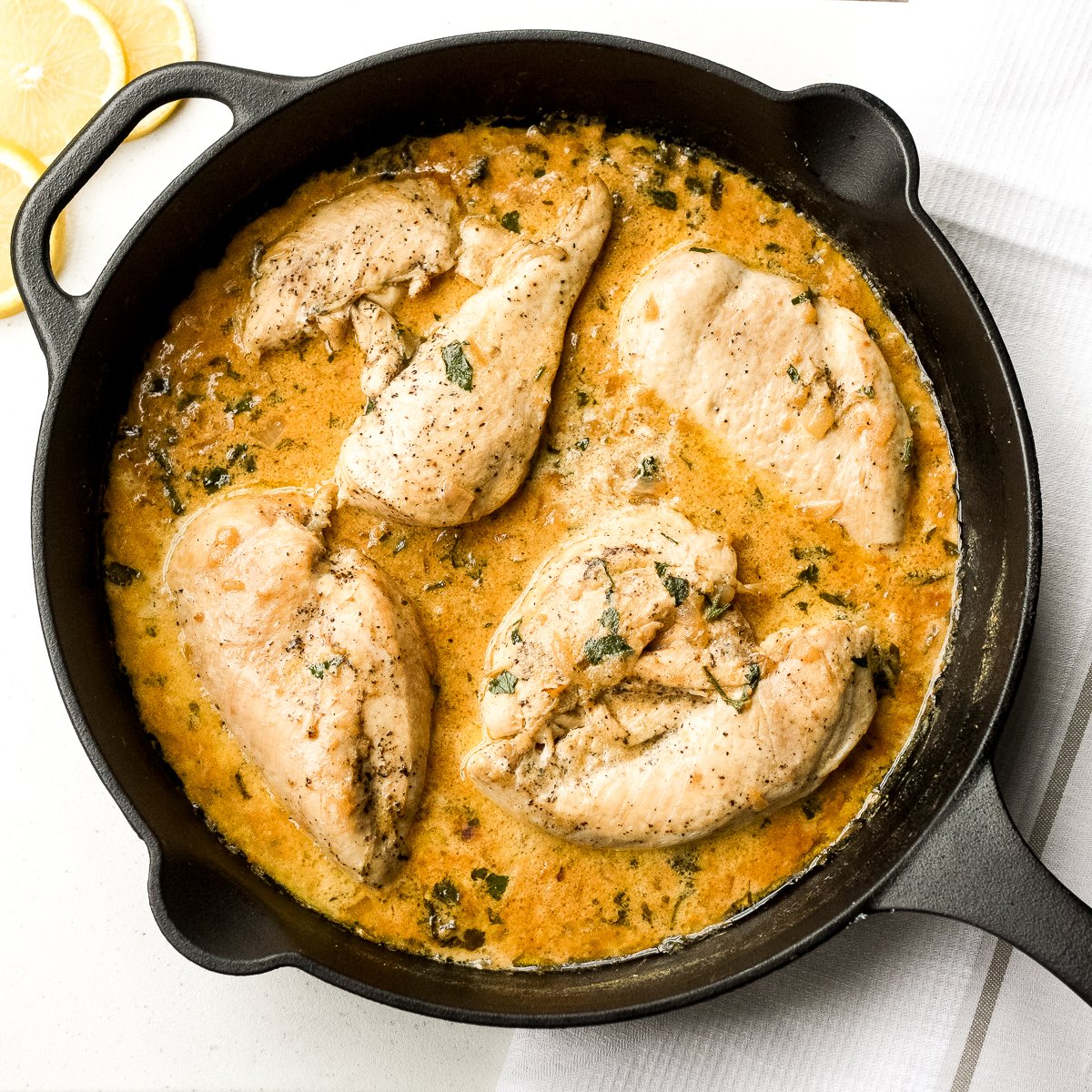 https://www.aheadofthyme.com/wp-content/uploads/2017/01/the-perfect-skillet-chicken-with-lemon-garlic-sauce-11.jpg