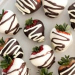 Chocolate covered strawberries are fancy, decadent, bite-sized treats that are loved by all. They are so simple and easy to make at home. | aheadofthyme.com