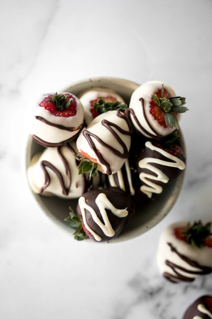 Chocolate covered strawberries are fancy, decadent, bite-sized treats that are loved by all. They are so simple and easy to make at home. | aheadofthyme.com