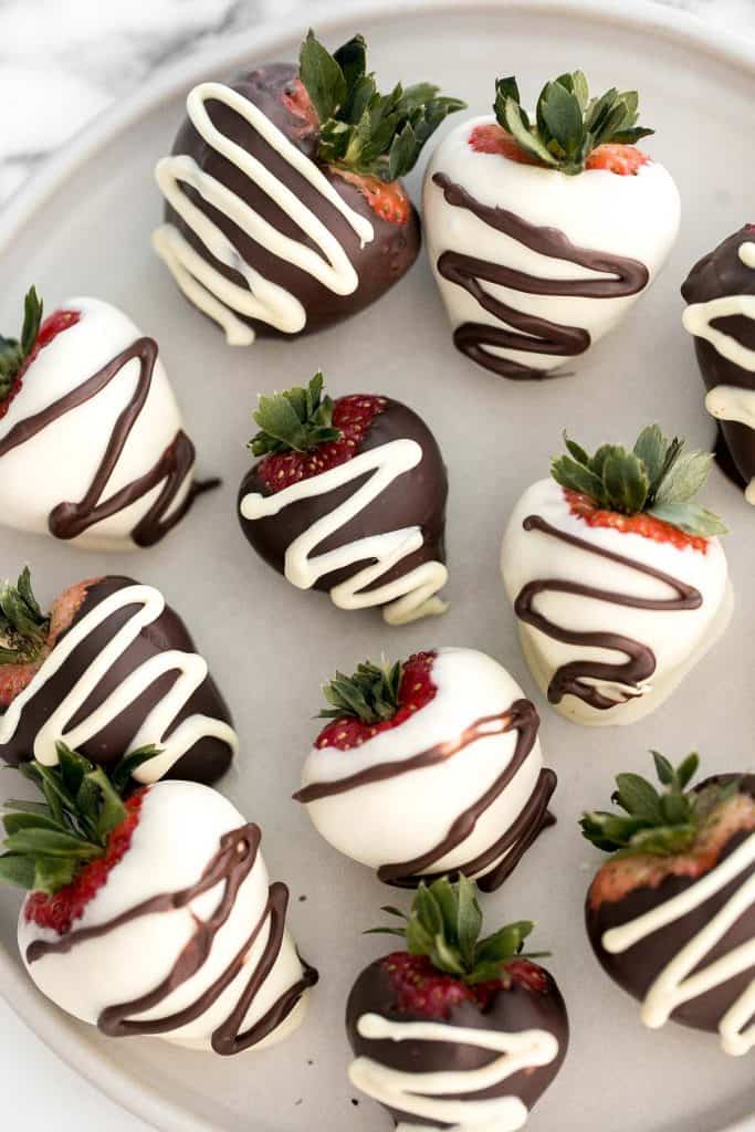 Chocolate covered strawberries are fancy, decadent, bite-sized treats that are loved by all. They are so simple and easy to make at home. | aheadofthyme.com