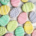 Cute, delicious, and easy-to-make Easter egg sugar cookies with royal icing are the perfect treat to make this Easter. Crisp outside and soft inside. | aheadofthyme.com