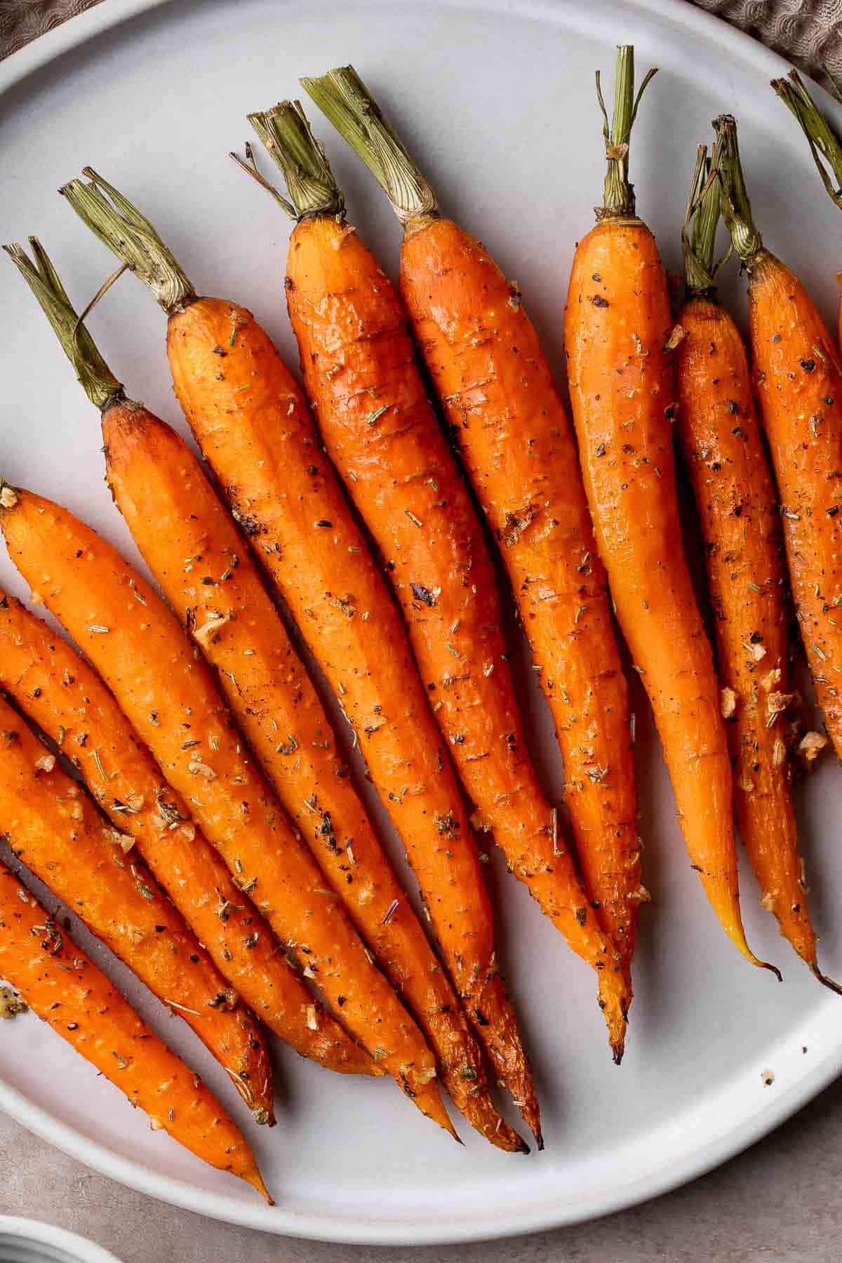 Garlic and herb roasted carrots are delicious and flavorful, easy to make, and the perfect vegan Easter side dish — or for any time of the year! | aheadofthyme.com