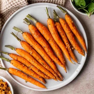 Garlic and herb roasted carrots are delicious and flavorful, easy to make, and the perfect vegan Easter side dish — or for any time of the year! | aheadofthyme.com