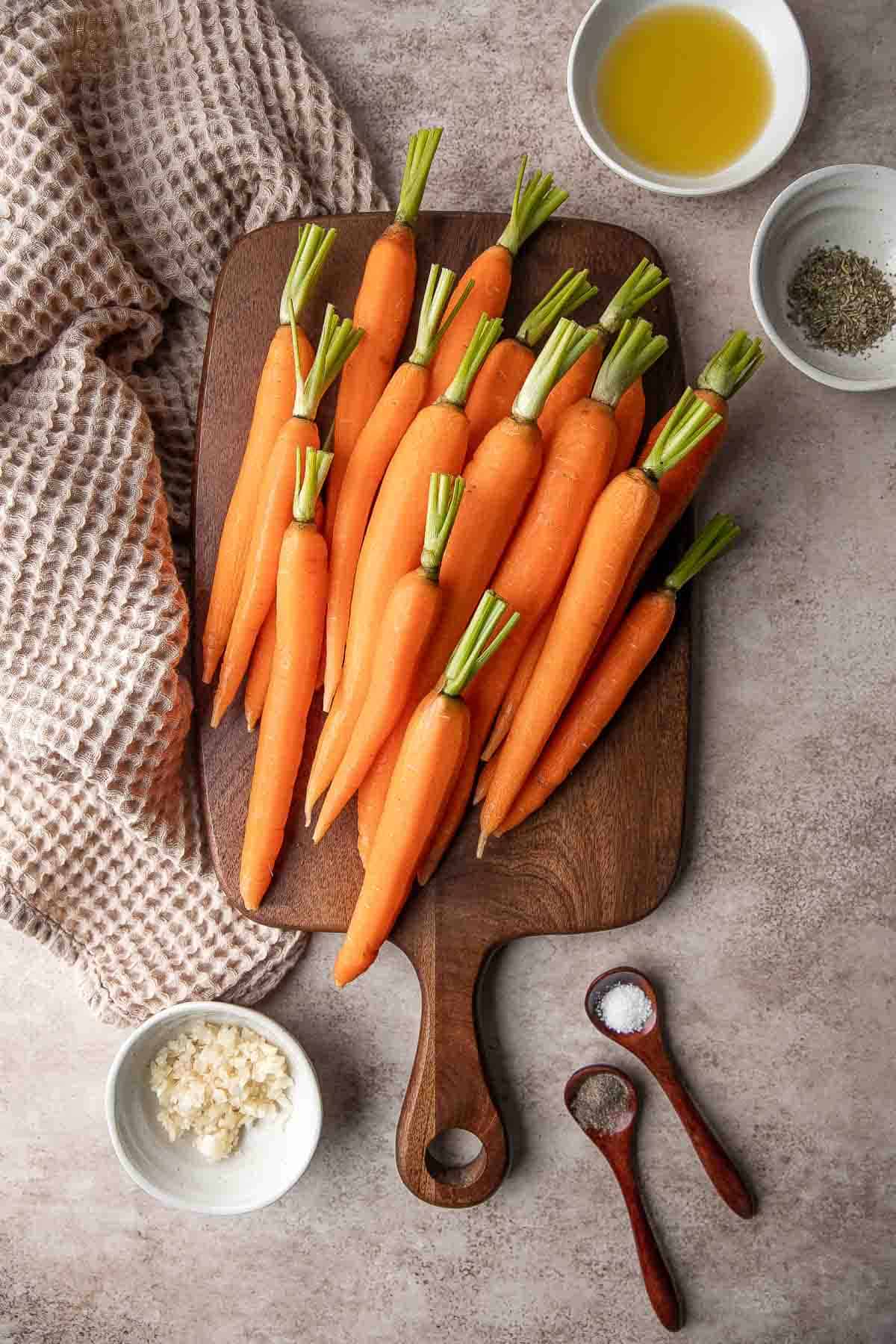 Garlic and herb roasted carrots are delicious and flavorful, easy to make, and the perfect vegan Easter side dish — or for any time of the year! | aheadofthyme.com