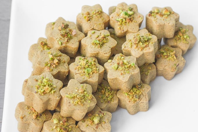 Persian Chickpea Cookies with Pistachio (Nan-e Nokhodchi) is a crumbly, melt-in-your-mouth cookie, made with the fragrant flavours of rose water, cardamom and pistachio. | aheadofthyme.com