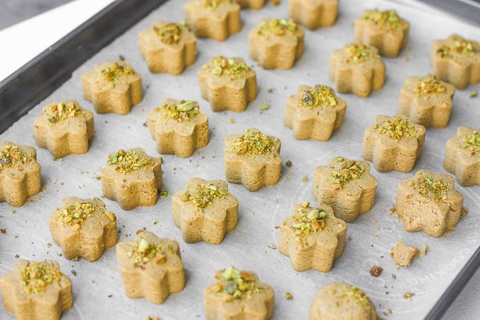 Persian Chickpea Cookies with Pistachio (Nan-e Nokhodchi) is a crumbly, melt-in-your-mouth cookie, made with the fragrant flavours of rose water, cardamom and pistachio. | aheadofthyme.com